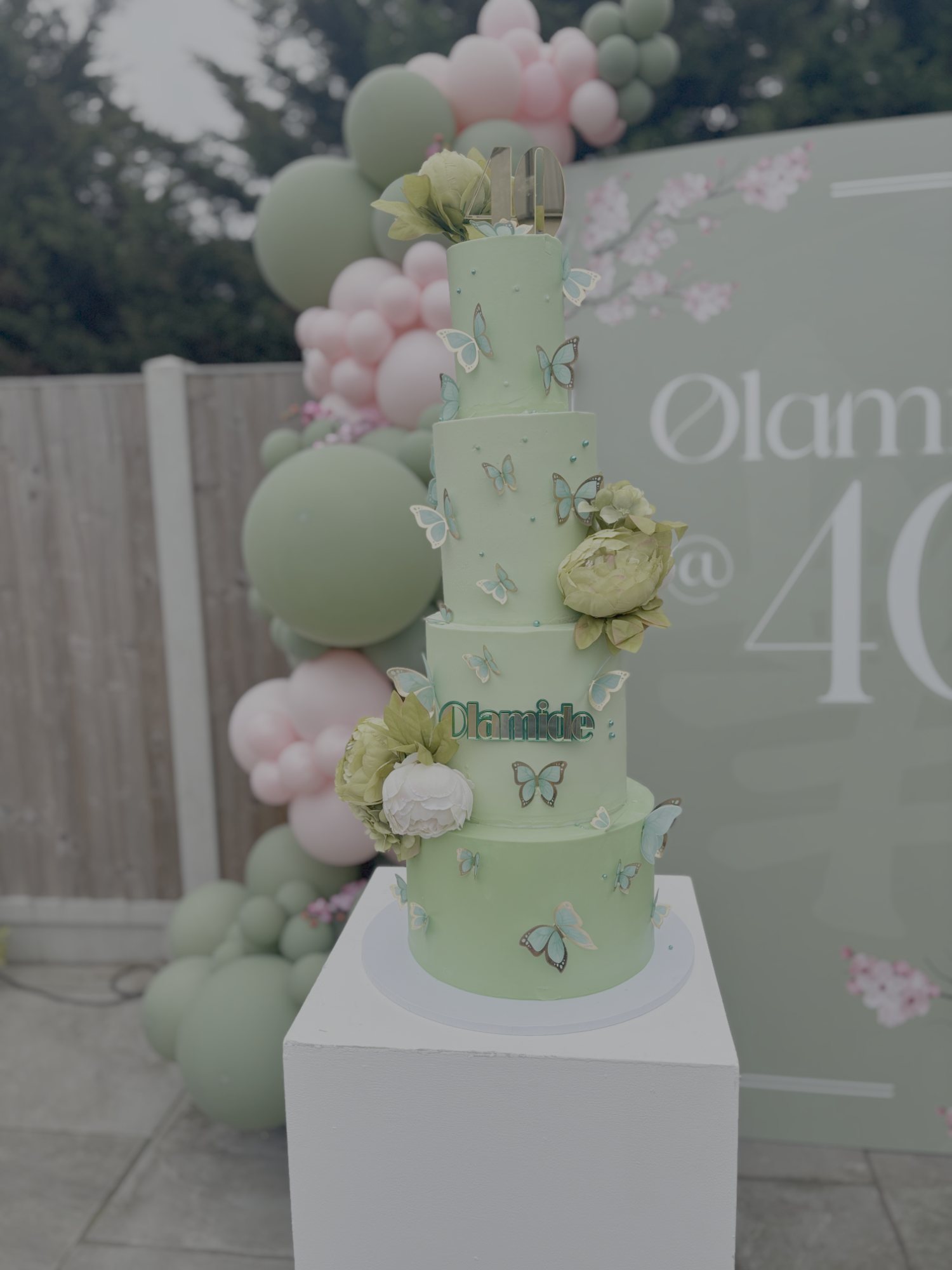 Emerald and butterfly fortieth birthday milestone cake by Thistleberry Cake Studio